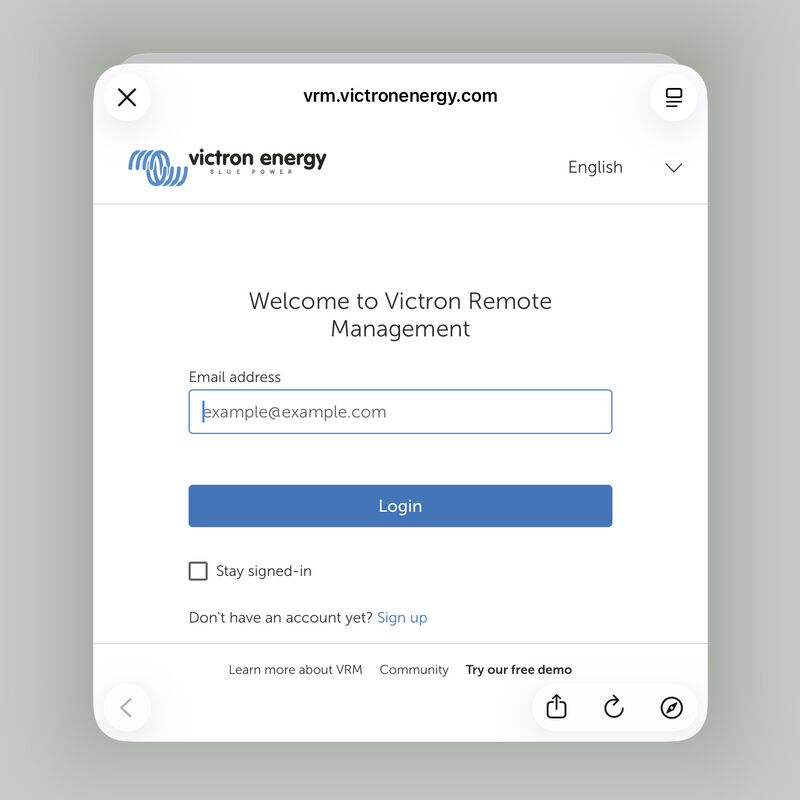 The Victron Remote Management sign-in page, open in a
      browser sheet inside the app, with an email address field and a Login
      button.